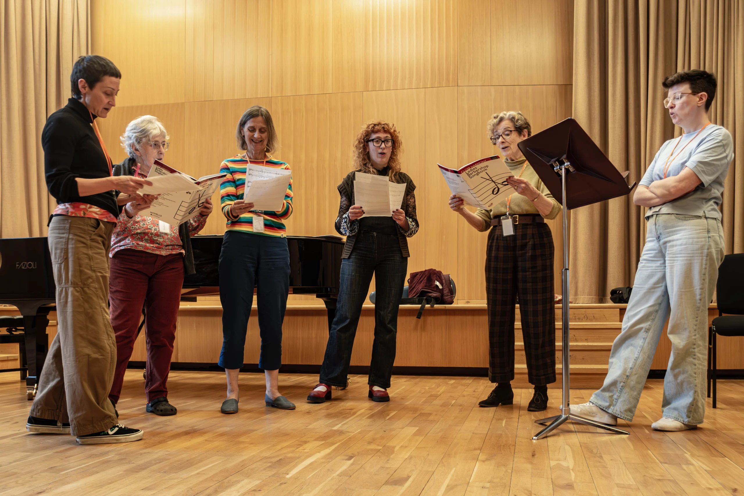 A group of singers rehearsing